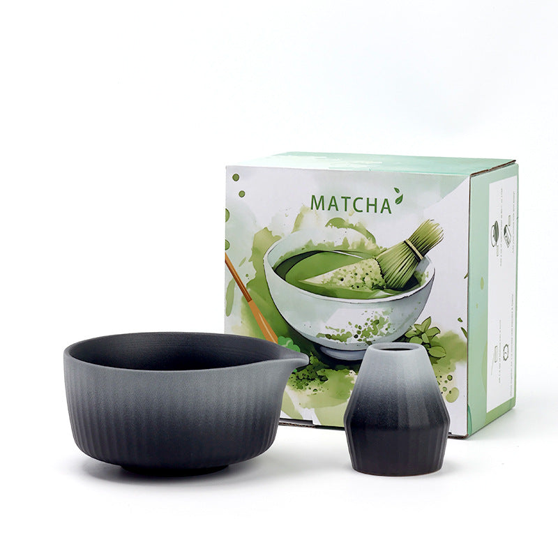 Vertical Ridges - Black White ceramic bowl and coordinating whisk holder beside the associated MATCHA carton