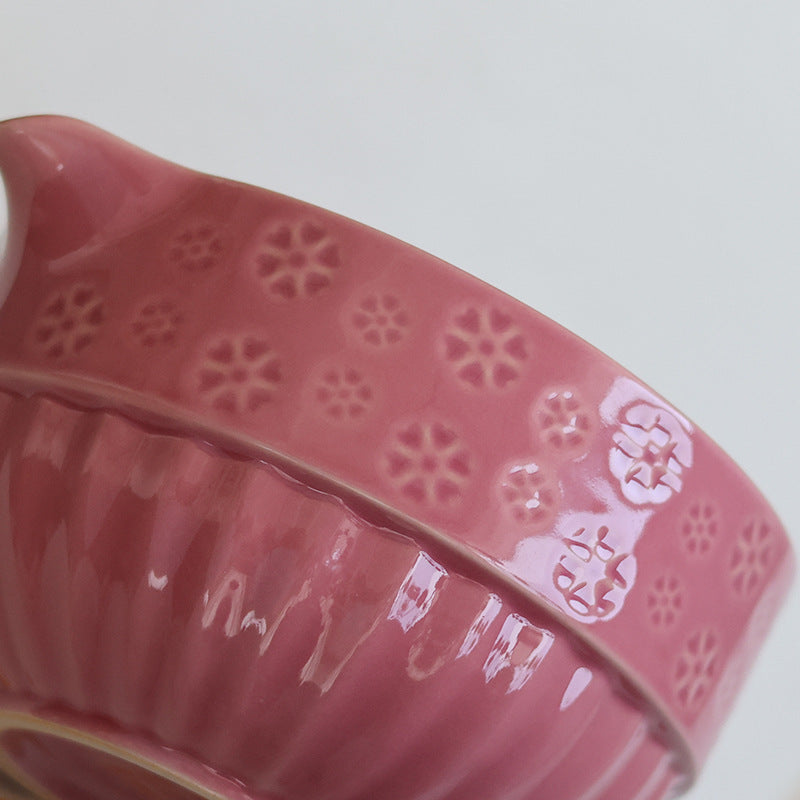 Close-up of the Rose Pink bowl floral band and fluted ceramic body