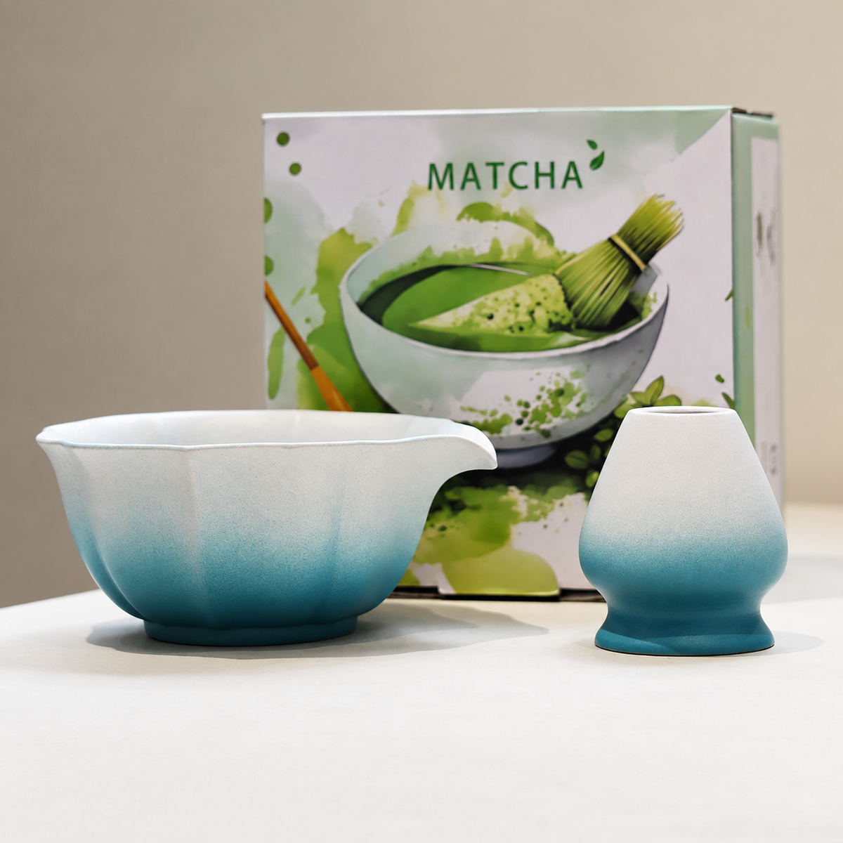 Blue scalloped ceramic matcha bowl and whisk holder with printed English gift box