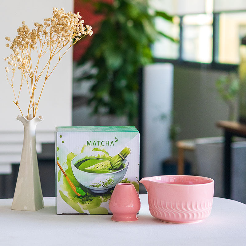 Pink relief-pattern matcha bowl and matching whisk holder with illustrated MATCHA box