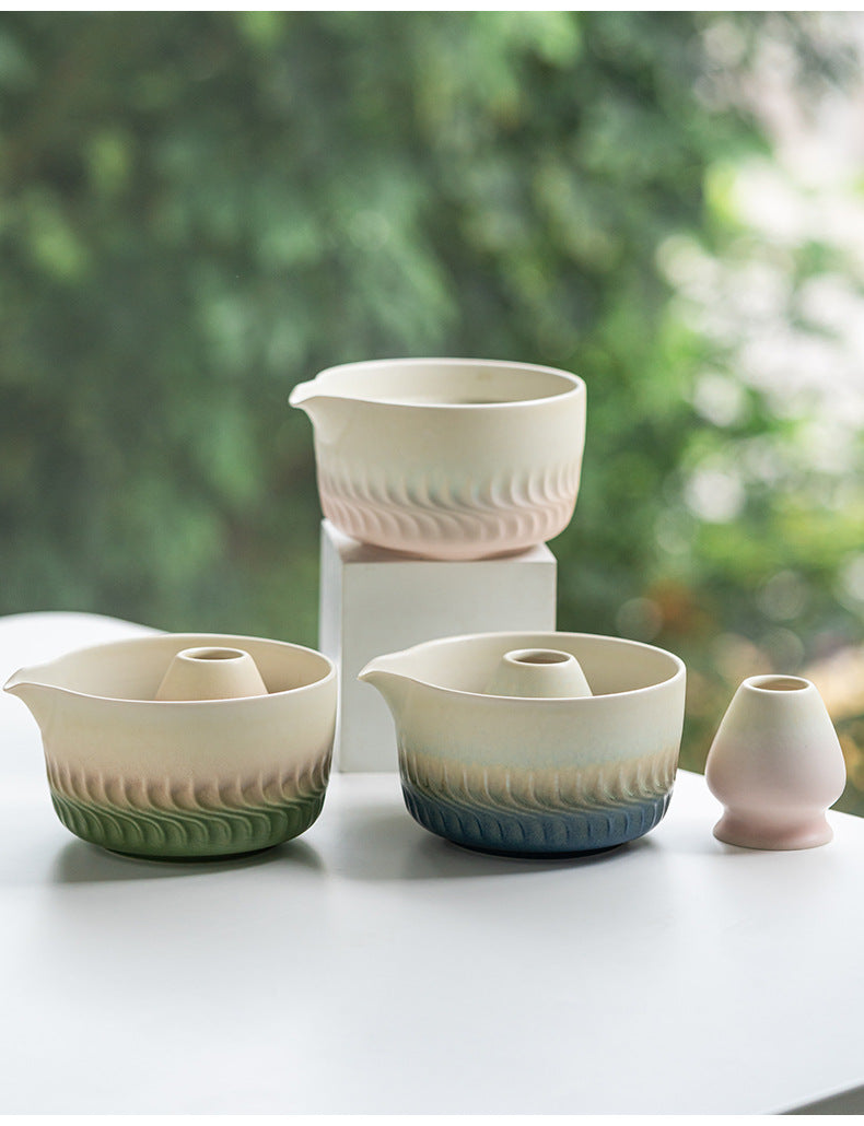 Three gradient bowl colors showing the pouring lips and holders resting inside the bowls