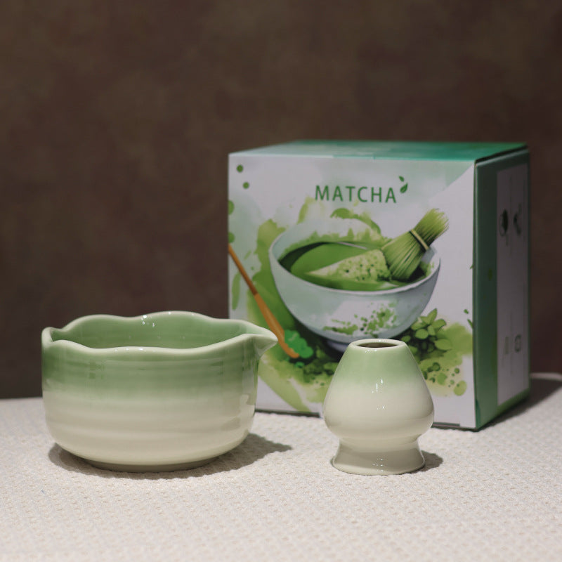 Green and White scalloped-rim matcha bowl and matching holder with illustrated MATCHA box