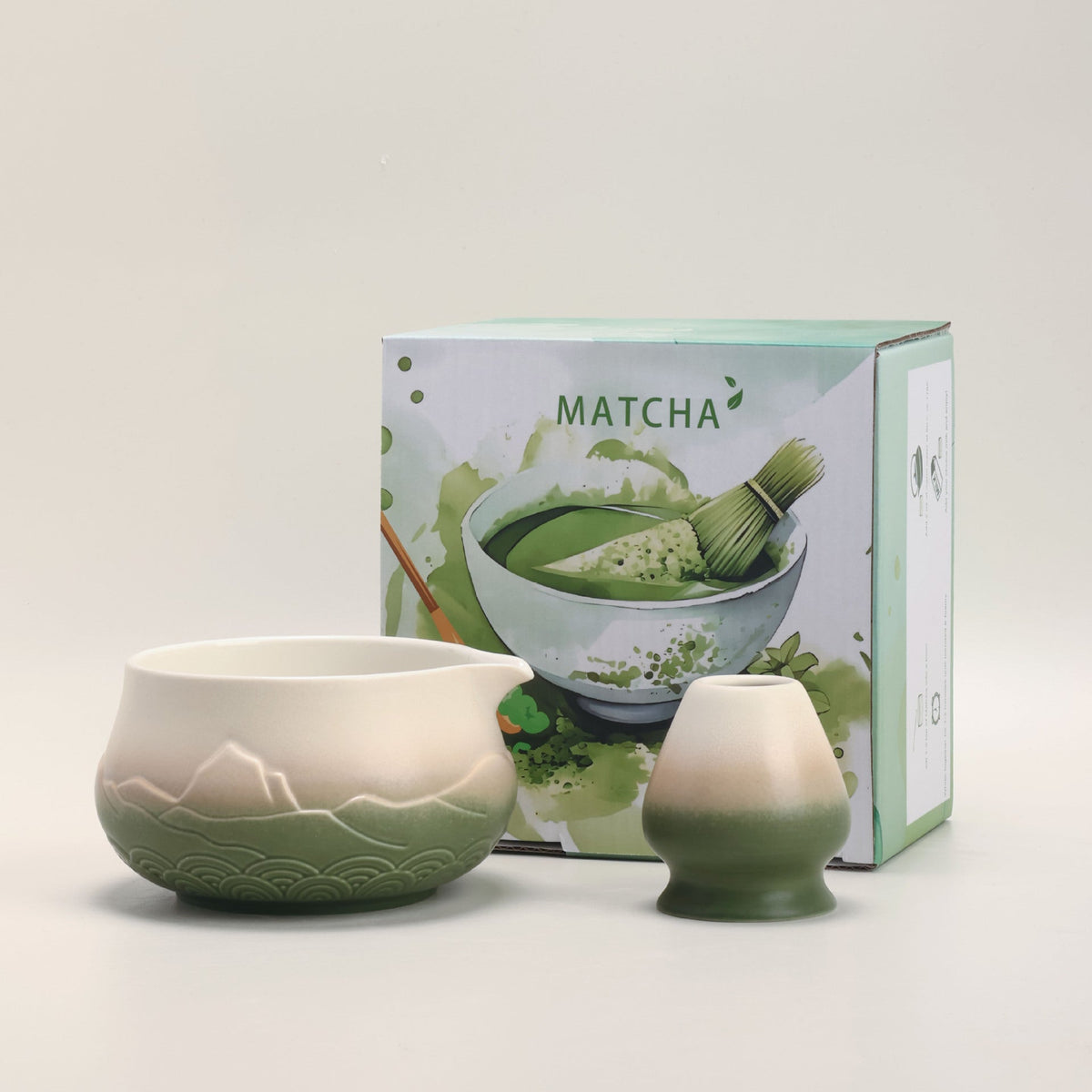 Green Gradient ceramic matcha bowl and matching whisk holder with its retail box