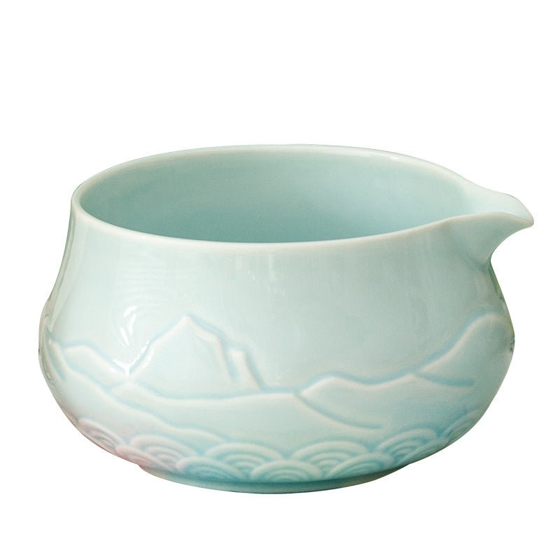 Celadon matcha bowl showing the raised mountain and wave pattern and pouring spout