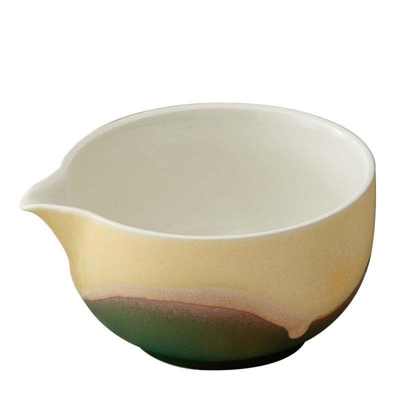 Close view of the Forest Green bowl showing layered mountain glaze, white interior and pouring spout