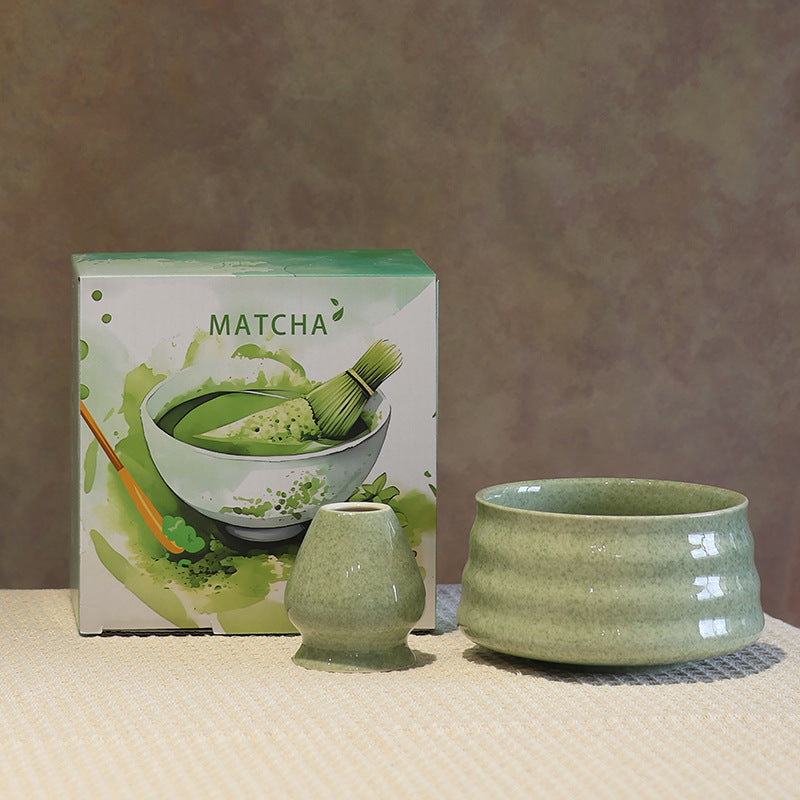 Style 12 - Wave Profile ceramic matcha bowl and holder with the associated English MATCHA carton
