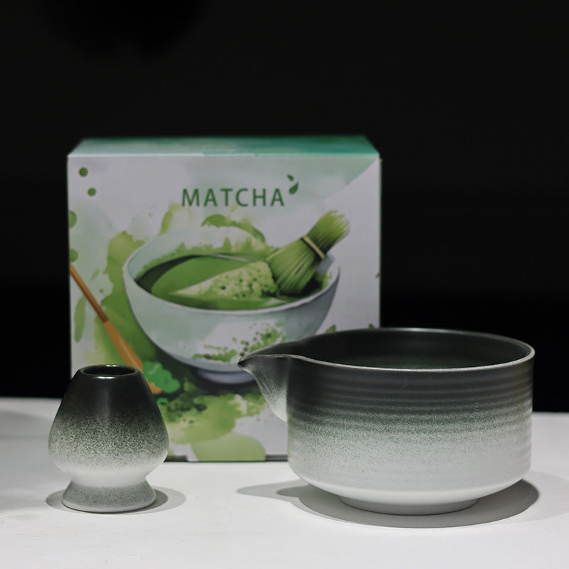 Black and White ceramic matcha bowl and matching whisk holder with its retail box